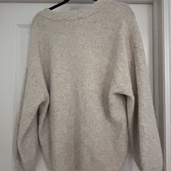 Chic Beige V-Neck Sweater with Intricate Pattern - Picture 4 of 9